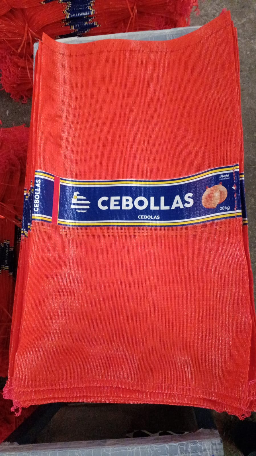 Bolsa roja con faja para coser a maquina